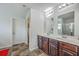 Bright bathroom features double sinks with spacious vanity and a separate shower at 134 Stoney Creek Way, Moncks Corner, SC 29461