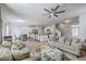 Open living space connects the living room, dining area, and a kitchen with island seating at 134 Stoney Creek Way, Moncks Corner, SC 29461