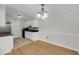 Well-lit kitchen with tile flooring, ample cabinets, and modern appliances in neutral tones at 1402 Camp Rd # 8B, Charleston, SC 29412