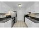 Efficient kitchen features stainless steel appliances, tile backsplash, and ample cabinet space at 1402 Camp Rd # 8B, Charleston, SC 29412