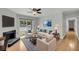 Cozy living room features a fireplace, comfortable seating, and access to outdoor space at 1402 Camp Rd # 8B, Charleston, SC 29412