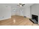 Inviting living room with fireplace, hardwood floors, and ample space for personalization at 1402 Camp Rd # 8B, Charleston, SC 29412