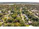 Expansive aerial shot of a vibrant neighborhood, showcasing lush greenery and scenic views of the inter-coastal waterway at 1454 Seminole St, Mount Pleasant, SC 29464