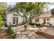 Well-maintained backyard with a pebble-covered area, chairs, and lush landscaping, perfect for outdoor activities at 1454 Seminole St, Mount Pleasant, SC 29464