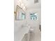 Bathroom features tile flooring, white tile walls, and a bright gold mirror at 1454 Seminole St, Mount Pleasant, SC 29464