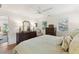 Bright bedroom with neutral walls, wood floors, and stylish furnishings create a relaxing retreat at 1454 Seminole St, Mount Pleasant, SC 29464