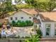Aerial view of the home with a backyard seating area, well-kept landscaping, and mature trees at 1454 Seminole St, Mount Pleasant, SC 29464