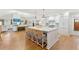 A modern kitchen with a large island and seating, perfect for entertaining and casual dining at 1454 Seminole St, Mount Pleasant, SC 29464