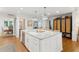 Spacious kitchen island with white cabinets, marble countertops, and an open design at 1454 Seminole St, Mount Pleasant, SC 29464
