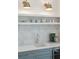 Elegant kitchenette featuring updated cabinets, quartz countertops, stylish fixtures, and convenient drink fridge at 1454 Seminole St, Mount Pleasant, SC 29464