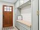 Convenient mudroom with built-in bench seating, ample storage, and stylish decor for an organized entry at 1454 Seminole St, Mount Pleasant, SC 29464