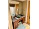 Bathroom featuring a granite countertop, vessel sink and stone tile flooring at 150 Bee St # 611, Charleston, SC 29401
