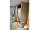 Bathroom featuring a shower and stone tile flooring at 150 Bee St # 611, Charleston, SC 29401