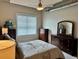 Comfortable bedroom with neutral tones and a ceiling fan for a relaxing ambiance at 150 Bee St # 611, Charleston, SC 29401