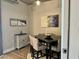 Bright dining room featuring modern decor, a sleek table, and stylish seating for intimate gatherings at 150 Bee St # 611, Charleston, SC 29401