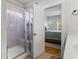 Modern bathroom with a glass shower and entry view to the main bedroom at 1513 Thin Pine Dr, Johns Island, SC 29455