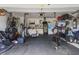 Organized garage space, rubber flooring, bike storage, workout equipment at 1513 Thin Pine Dr, Johns Island, SC 29455