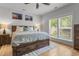 Spacious main bedroom featuring wood furnishings, a ceiling fan, and plenty of natural light at 1513 Thin Pine Dr, Johns Island, SC 29455