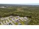 Aerial view showing homes in a suburban neighborhood surrounded by abundant trees at 154 Boots Branch Rd, Summerville, SC 29485