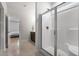 Modern bathroom featuring a glass-enclosed shower, tiled floors, and a vanity at 154 Boots Branch Rd, Summerville, SC 29485