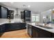 Well-lit kitchen featuring stainless steel appliances, a subway tile backsplash, and modern cabinetry at 154 Boots Branch Rd, Summerville, SC 29485