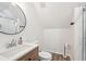 Bathroom featuring a modern vanity, sink, toilet, and a shower with glass doors at 1614 Teal Marsh Rd, Charleston, SC 29412