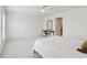 Spacious bedroom features bright lighting, a ceiling fan, and comfortable bed at 1614 Teal Marsh Rd, Charleston, SC 29412