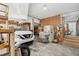 Garage interior features a car, storage shelves, and workspace, providing practicality and organization at 1614 Teal Marsh Rd, Charleston, SC 29412
