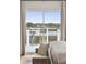Charming water view from the bedroom featuring a deck, seating and view at 1614 Teal Marsh Rd, Charleston, SC 29412