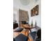 Cozy dining area with brick accent wall, seating for four, and rustic charm at 162 Spring St # A, Charleston, SC 29403