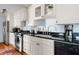 Well-equipped kitchen featuring stainless steel appliances, granite countertops, and ample storage at 162 Spring St # A, Charleston, SC 29403