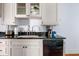 Modern kitchen with black granite countertops and stainless appliances at 162 Spring St # A, Charleston, SC 29403