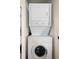 Convenient laundry area featuring a stacked washer and dryer at 162 Spring St # A, Charleston, SC 29403