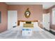 Comfortable bedroom featuring a large bed, decorative mirror, and warm, inviting colors at 162 Spring St # D, Charleston, SC 29403