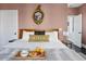 Bedroom with a king size bed, breakfast, and natural light at 162 Spring St # D, Charleston, SC 29403