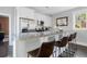 Modern kitchen with stainless steel appliances, granite counters and room for seating at 162 Spring St # D, Charleston, SC 29403