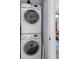 Efficient laundry area with stacked washer and dryer, maximizing space and convenience at 162 Spring St # D, Charleston, SC 29403