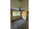 Bedroom with a window, ceiling fan, and closet space offering a basic, functional design at 1633 Southwick Dr, Johns Island, SC 29455
