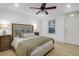 Bright bedroom features light hardwood floors, soft bedding, and natural light at 1637 Pinckney Park Dr, Charleston, SC 29407