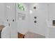 Bright bathroom features a marble-tiled shower, a bench, and bronze fixtures at 1637 Pinckney Park Dr, Charleston, SC 29407