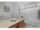 Clean bathroom featuring a vanity, a large mirror, and a shower with patterned curtains at 1726 Waterbrook Dr, Charleston, SC 29414