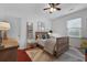 Comfortable bedroom with a bed, a nightstand, a side table, and a window at 1726 Waterbrook Dr, Charleston, SC 29414