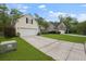 Well maintained property showing long driveway and two car garage at 1726 Waterbrook Dr, Charleston, SC 29414