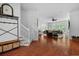 Open-concept living room with hardwood floors, a ceiling fan, and ample natural light at 1726 Waterbrook Dr, Charleston, SC 29414