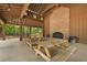 Spacious indoor pavilion featuring picnic tables and an inviting brick fireplace, ideal for socializing at 1726 Waterbrook Dr, Charleston, SC 29414