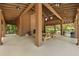 Interior shot of the community pavilion with picnic tables, fireplace, and ceiling fans at 1726 Waterbrook Dr, Charleston, SC 29414