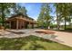 Community pavilion with a brick fireplace, picnic tables, and outdoor space at 1726 Waterbrook Dr, Charleston, SC 29414