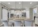 Spacious kitchen island with granite countertops, seating, and stainless steel appliances at 1814 Grovehurst Dr, Charleston, SC 29414