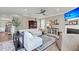 Comfortable living room featuring a stylish sectional sofa, fireplace, and modern ceiling fan at 1814 Grovehurst Dr, Charleston, SC 29414