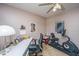 Bedroom featuring a ceiling fan, desk, and stationary bicycle at 206 Brailsford Rd, Summerville, SC 29485